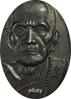 A Coin is LP MHUN, Generation PimLek-Big face, B. E. 2543, Thai Buddha Amulet