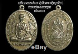 A coin is Lp Thob Temple Chang Puak, Last Generation C. E. 2519, Thai buddha Amulet