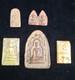 A collection of Buddhist Amulets Thailand Burma monastery gold leaf Elephant art