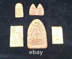 A collection of Buddhist Amulets Thailand Burma monastery gold leaf Elephant art