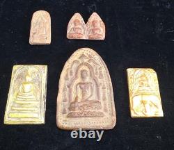 A collection of Buddhist Amulets Thailand Burma monastery gold leaf Elephant art