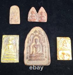 A collection of Buddhist Amulets Thailand Burma monastery gold leaf Elephant art