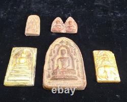 A collection of Buddhist Amulets Thailand Burma monastery gold leaf Elephant art