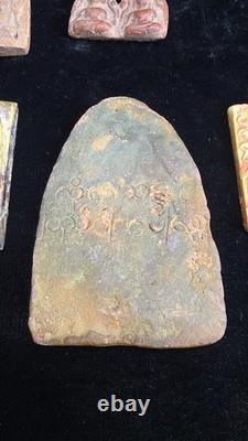 A collection of Buddhist Amulets Thailand Burma monastery gold leaf Elephant art