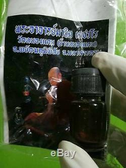 Namman Phrai charm oil Oracle Thai Amulet Thai Buddha Aj Manit