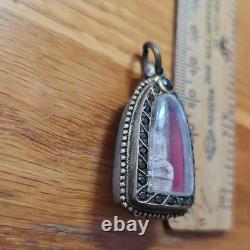 Thai Buddha Amulet Phra Rod Si Cow set in old antique silver case